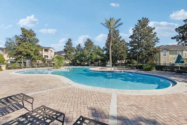 view of pool featuring a patio area