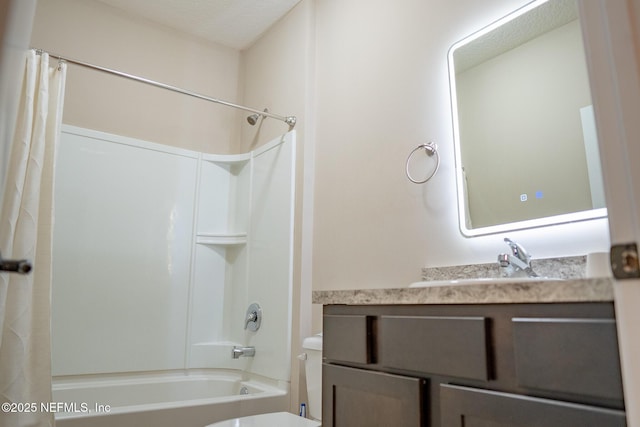 full bathroom featuring toilet, vanity, and shower / bath combo