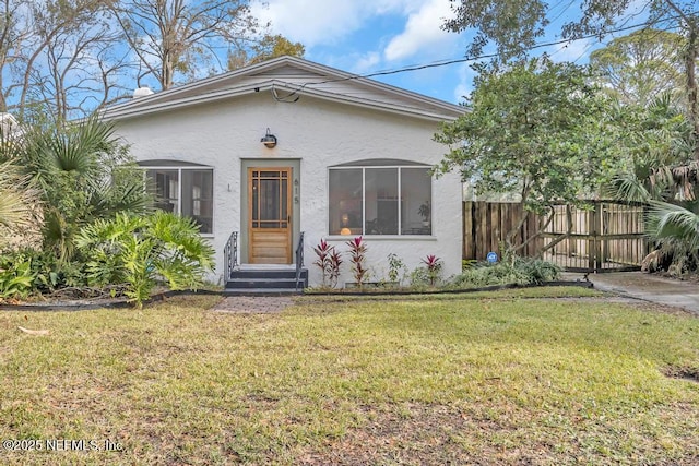 view of front of home with a front yard