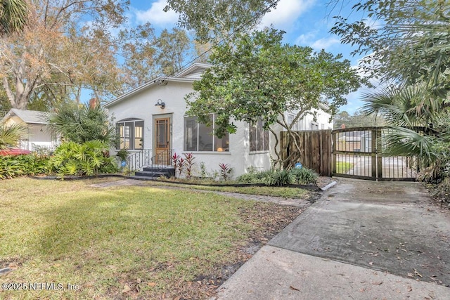 view of front of house with a front lawn