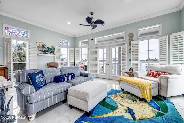 living room with crown molding, french doors, and light tile patterned floors