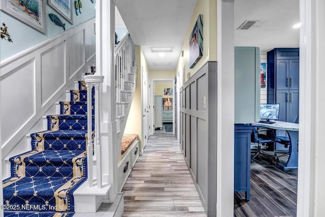 hallway featuring hardwood / wood-style floors