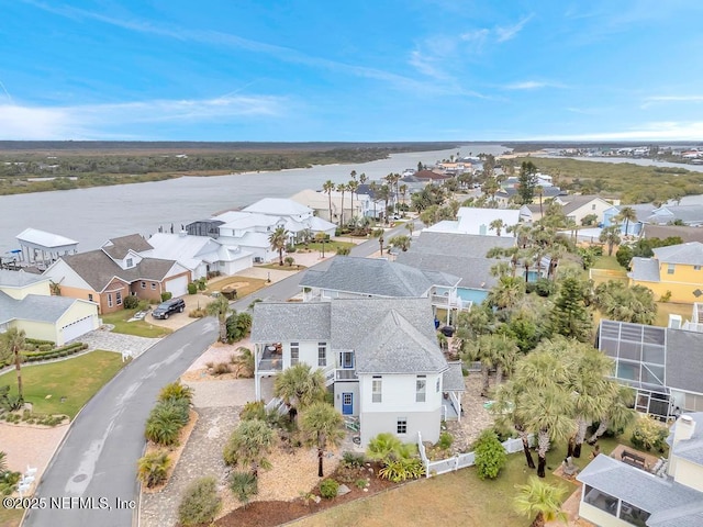 drone / aerial view featuring a water view