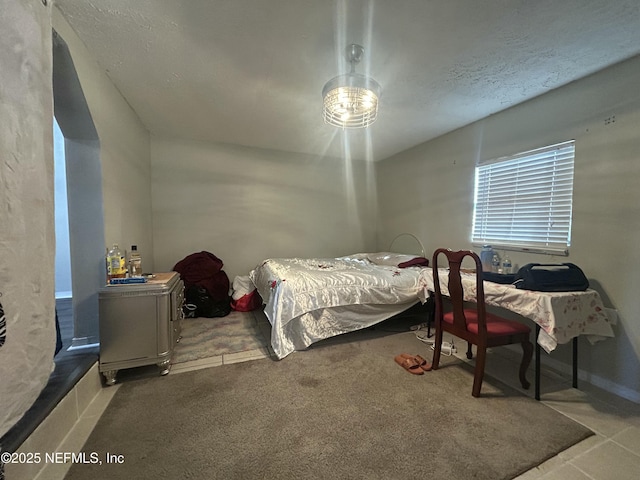 bedroom featuring light colored carpet