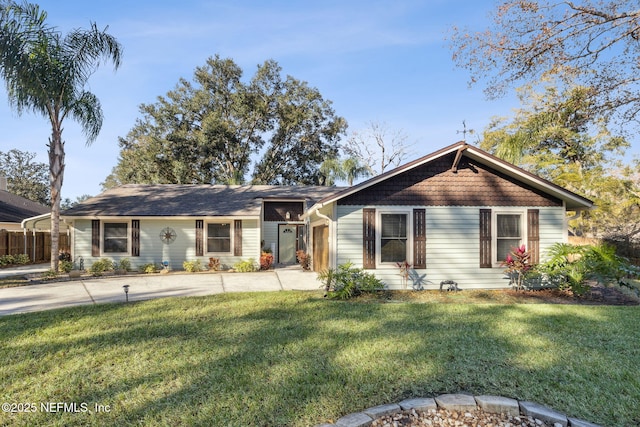 ranch-style house with a front lawn