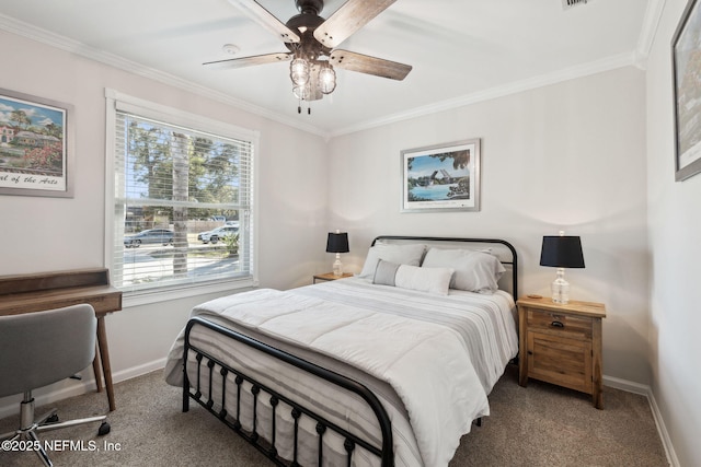 bedroom featuring multiple windows, ornamental molding, ceiling fan, and carpet flooring