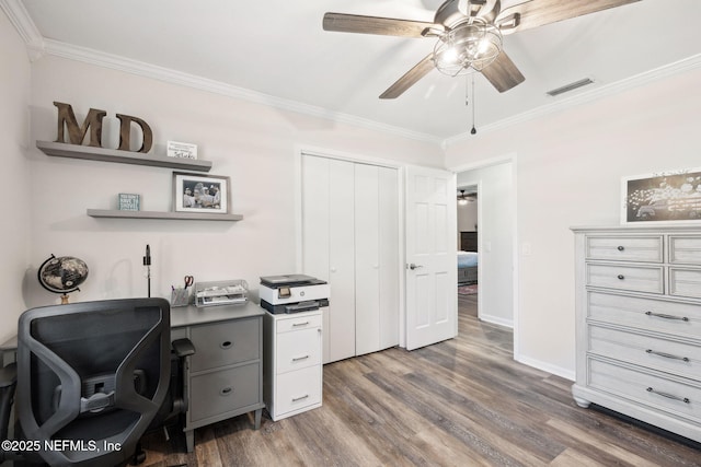 office with ornamental molding, dark hardwood / wood-style floors, and ceiling fan