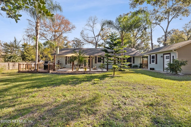 view of yard featuring a deck