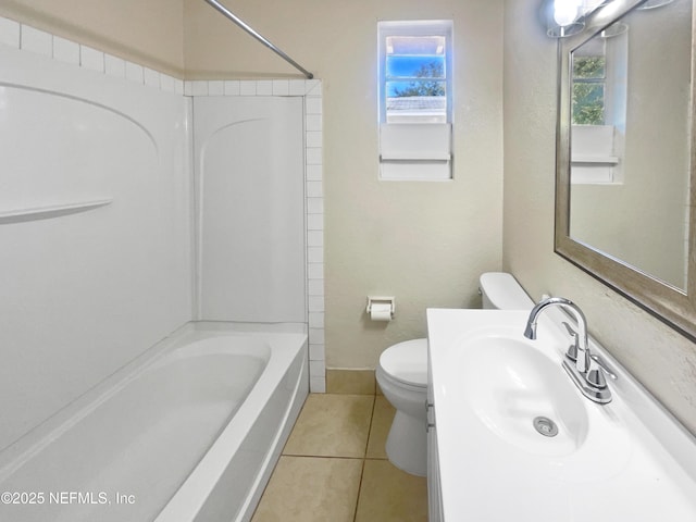 full bathroom featuring shower / bathing tub combination, toilet, sink, and tile patterned flooring