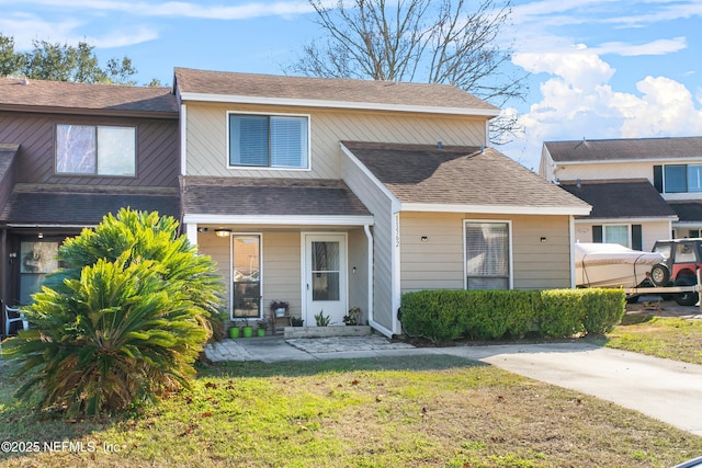 view of front of home featuring a front yard