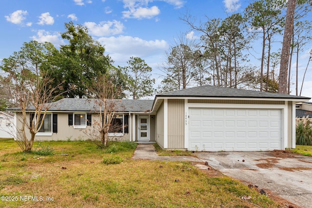 single story home featuring a garage and a front lawn