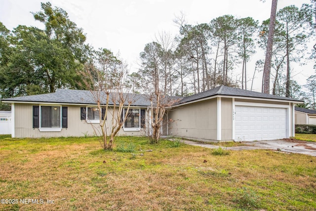 ranch-style house with a garage and a front yard