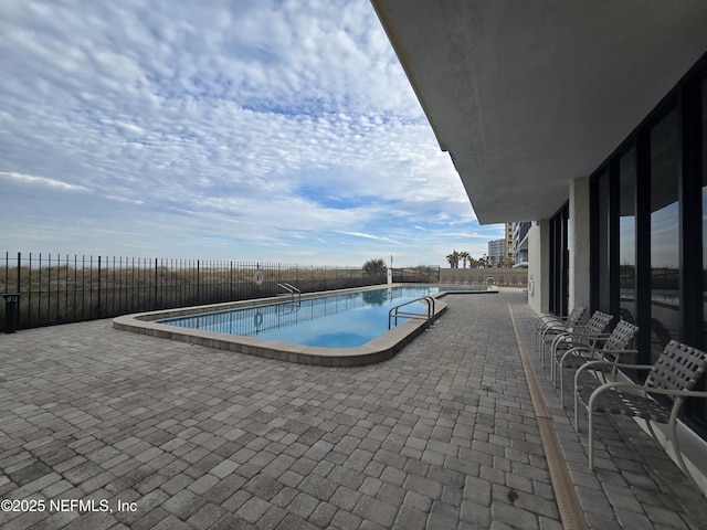 view of pool with a patio area