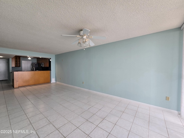 unfurnished living room featuring light tile patterned floors, a textured ceiling, baseboards, and a ceiling fan