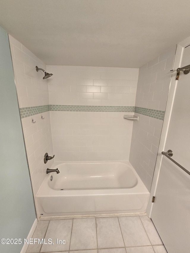 bathroom featuring shower / bath combination and tile patterned floors