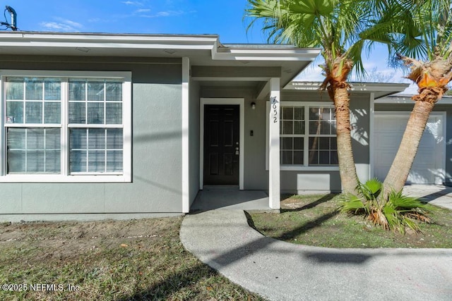 entrance to property with a garage