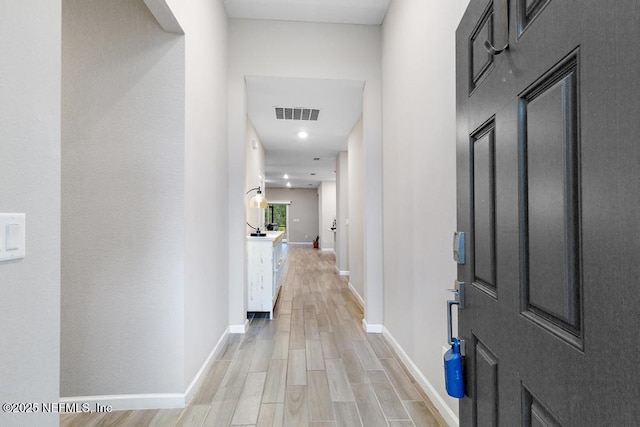 hallway featuring light hardwood / wood-style floors