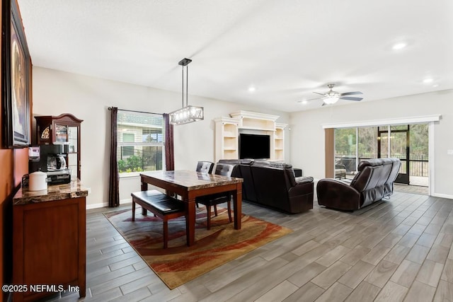 dining room featuring ceiling fan