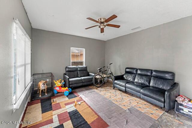 living room with ceiling fan