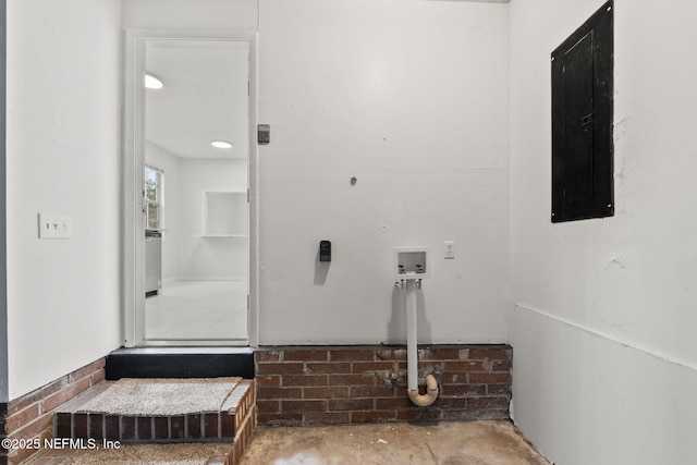 washroom with washer hookup and electric panel