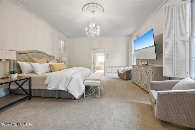 carpeted bedroom with an inviting chandelier and crown molding