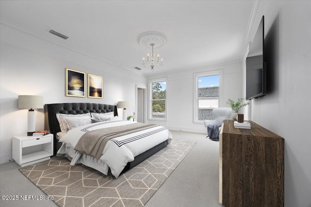 bedroom with ornamental molding, a chandelier, and carpet flooring