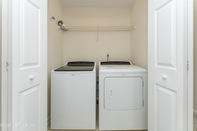 laundry area with washer and clothes dryer