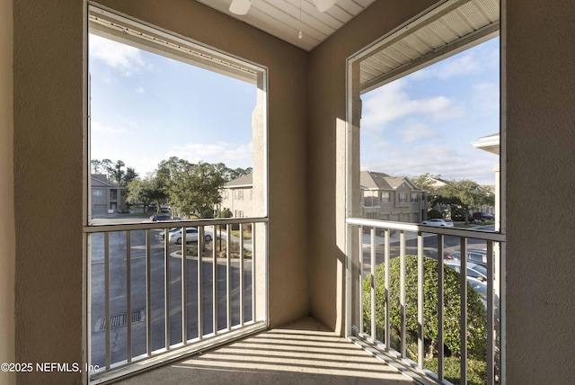 balcony featuring ceiling fan