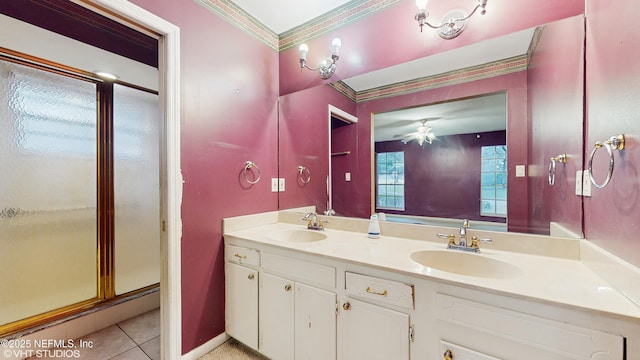 bathroom with tile patterned floors, vanity, walk in shower, ornamental molding, and ceiling fan