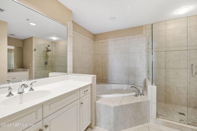 bathroom with vanity, tile patterned floors, and independent shower and bath