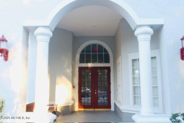 property entrance with french doors