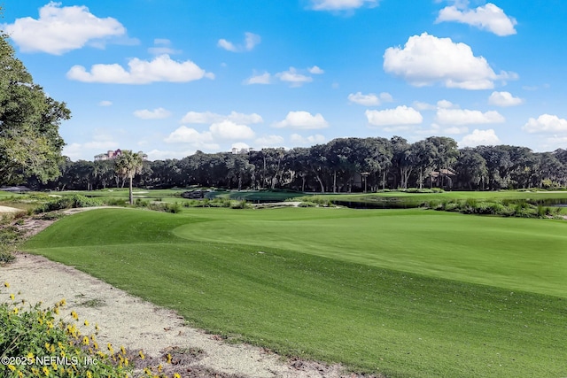 view of home's community featuring view of golf course