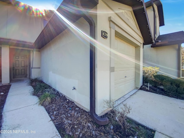 property entrance featuring a garage