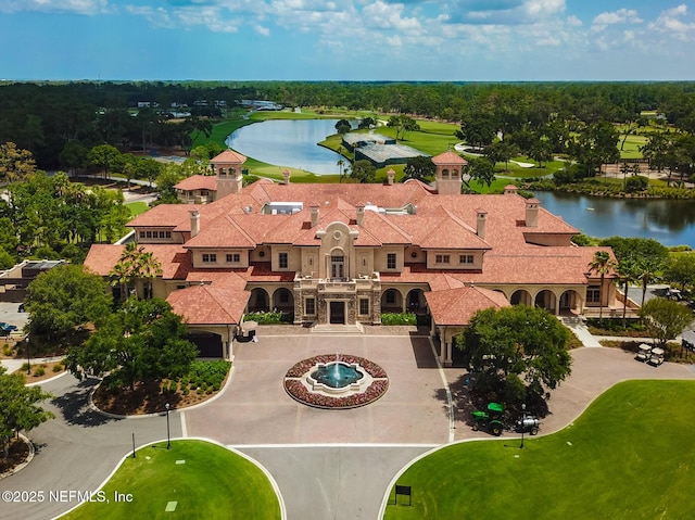 birds eye view of property featuring a water view