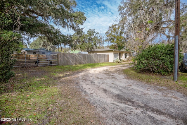 view of yard featuring a garage