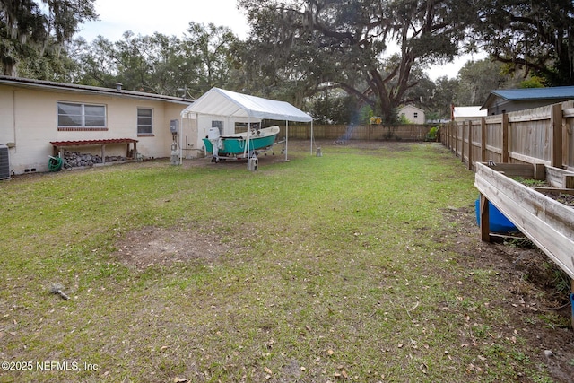 view of yard featuring central AC