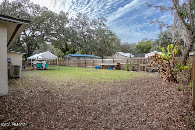 view of yard with central AC