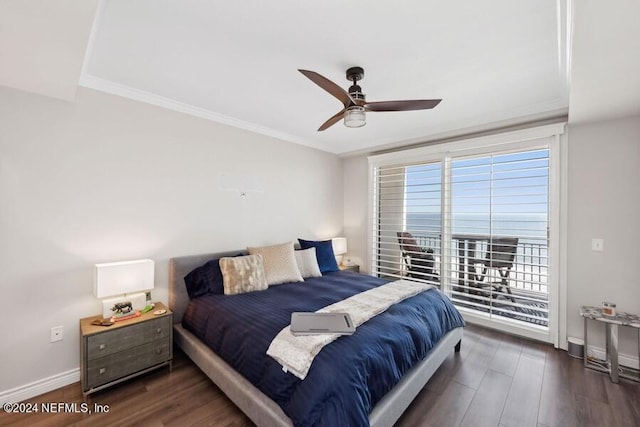 bedroom featuring ceiling fan, dark wood-type flooring, and ornamental molding