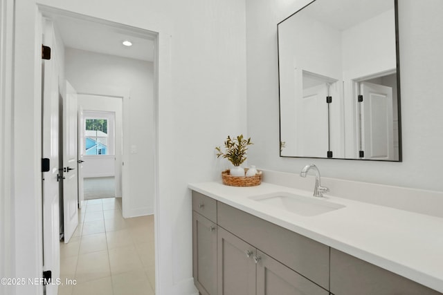 bathroom featuring tile patterned floors and vanity