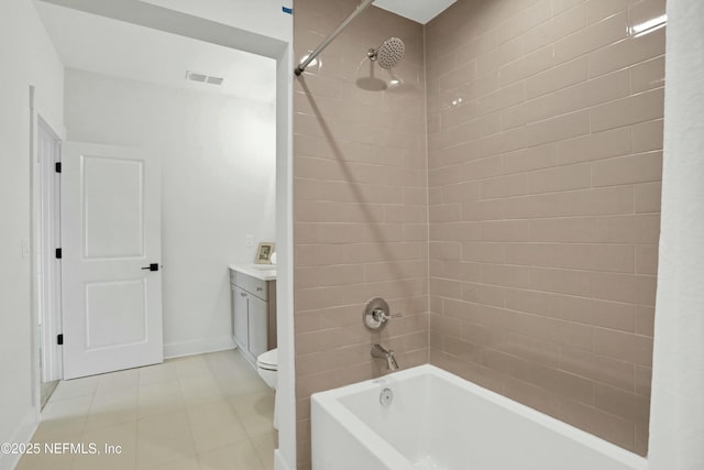 full bathroom featuring vanity, toilet, and tiled shower / bath