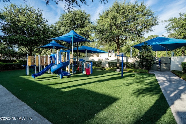 view of playground with a yard