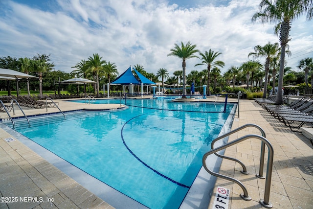 view of swimming pool featuring a gazebo and a patio