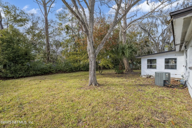 view of yard with central AC