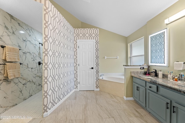 bathroom featuring vanity, lofted ceiling, and plus walk in shower