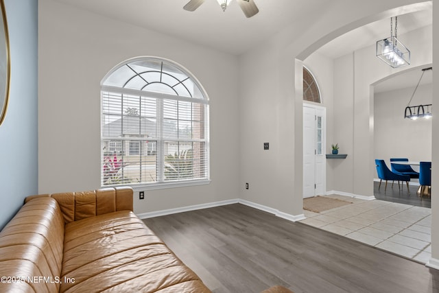 interior space with hardwood / wood-style flooring and ceiling fan