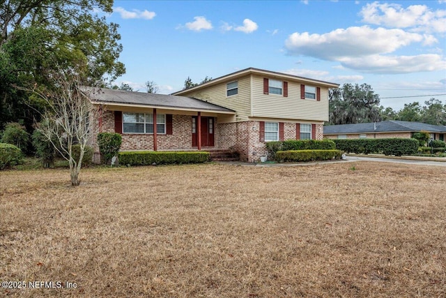 view of front of property with a front yard