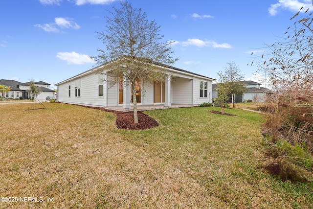 exterior space featuring a front lawn