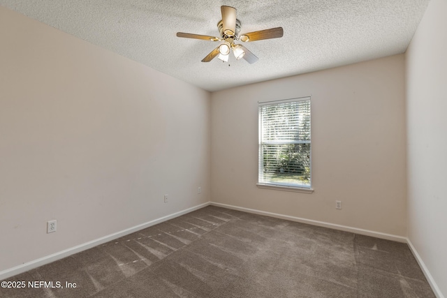 carpeted empty room with a textured ceiling and ceiling fan