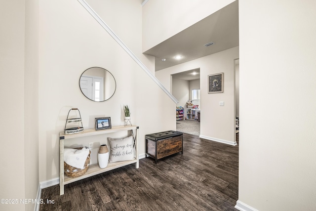 hallway featuring hardwood / wood-style flooring