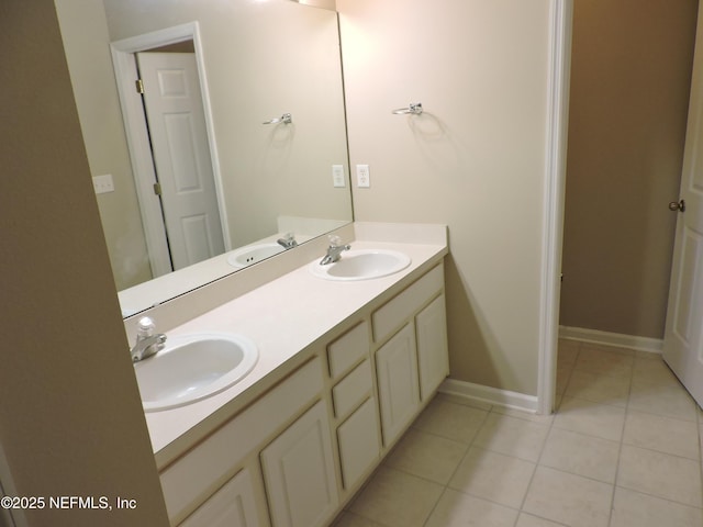 bathroom featuring vanity and tile patterned flooring